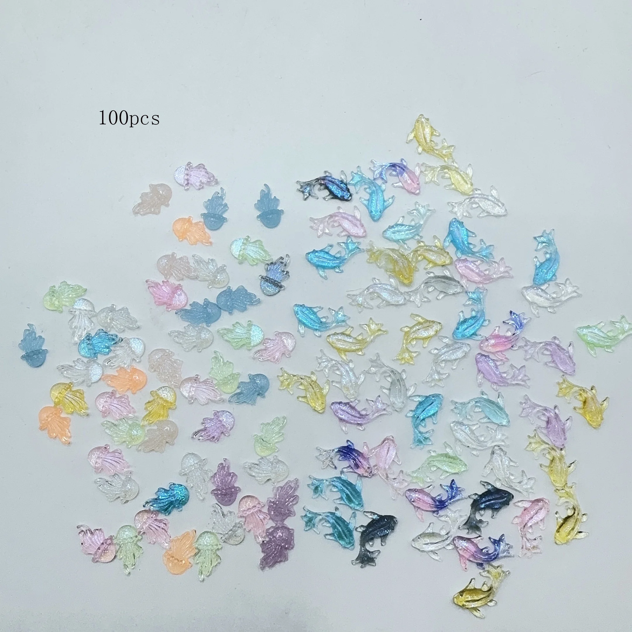 100 Stück Miniatur-Ozean-Tier-Charms-Set für Nagelkunst, niedliches Kawaii-Harz, Fisch, flache Rückseite, Strasssteine, DIY-Nageldekorationen