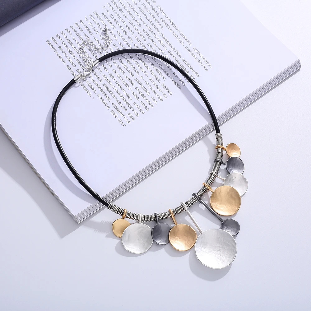 

Minimalist Jewelry –Strand Cord Necklace with Metal Wire Wrapped Details Featuring Silver Gold & Gunmetal Circular Pendants