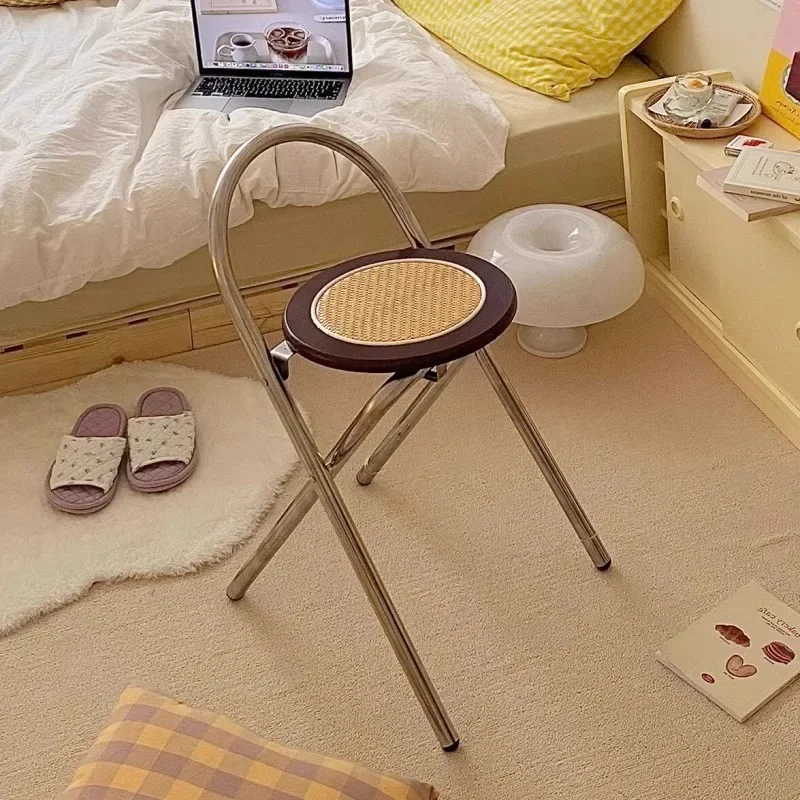 

Korean rattan folding stool ins wind can store creative medieval solid wood folding chair adult French small round stool