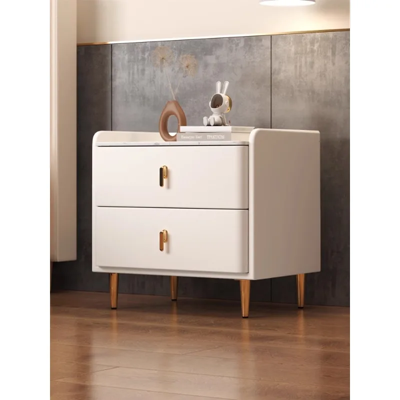 

A minimalist and modern household bedroom with a luxurious and luxurious feel. A new creative bedside storage cabinet