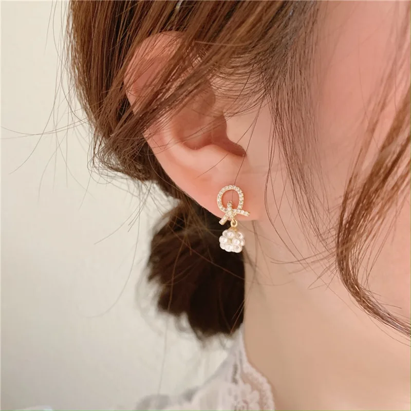 Pearl Grain Temperament Net Red Earrings Female Minority Design High Sense Of Versatility Simple Small Earrings Wholesale