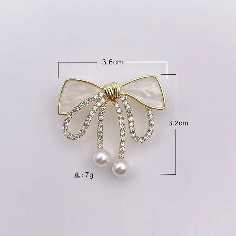 Broches nœud papillon en biscuits pour femmes, épingles exquises pour patients, nœud en cristal élégant, accessoires vestisensimbibés, cadeau de bijoux