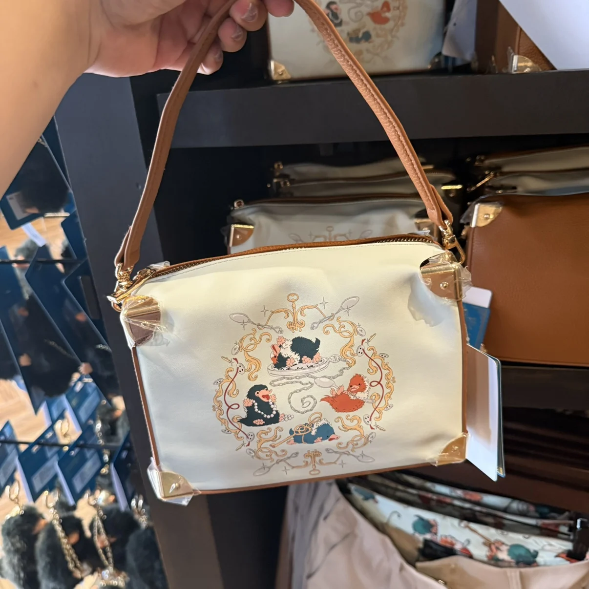 

Сувенир Universal Studios «Фантастические звери» — сумка-слинг Niffler для девочек, сумка идеально подходит в качестве праздничного подарка