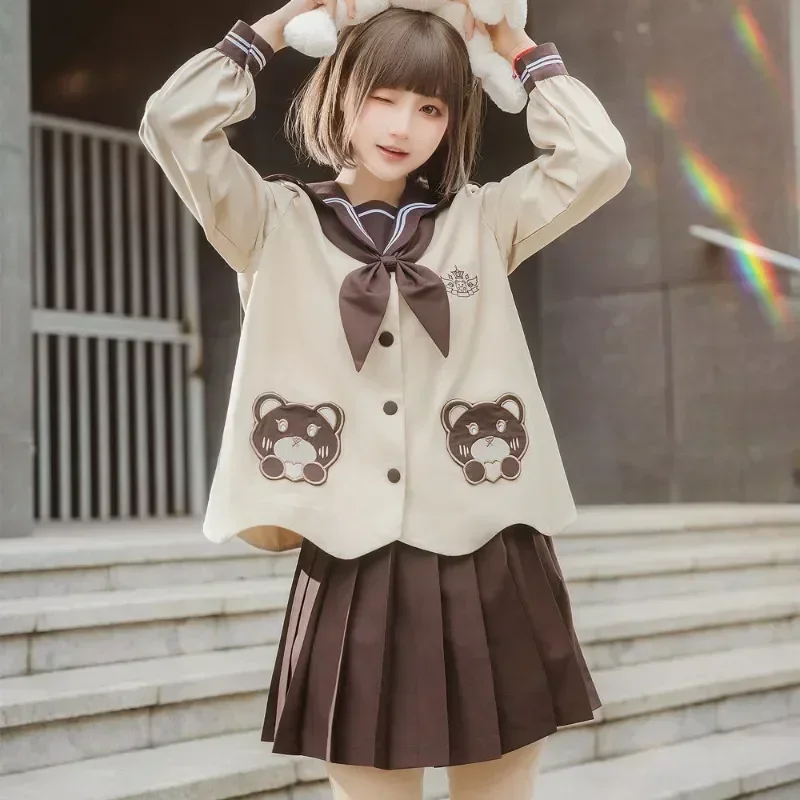 Uniforme pieghettata femminile estiva a maniche 2023 Sailor Cute Tie Girl Long Kawaii Brown con tuta da studente a orso corto