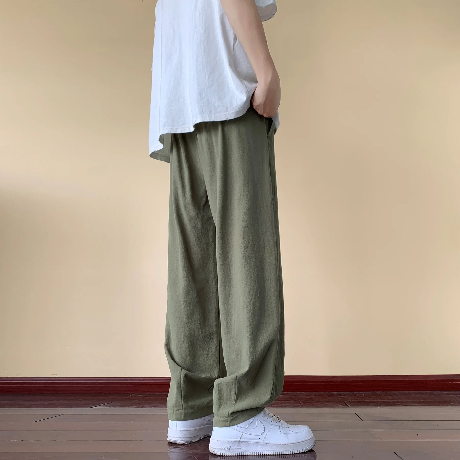 กางเกงฝ้ายลินินผู้ชายเอวยางยืดแบบบางระบายอากาศได้ดีกางเกงลำลองทรงหลวมสีพื้นกางเกงขาทรงกระบอก2024ฤดูใบไม้ผลิฤดูร้อน