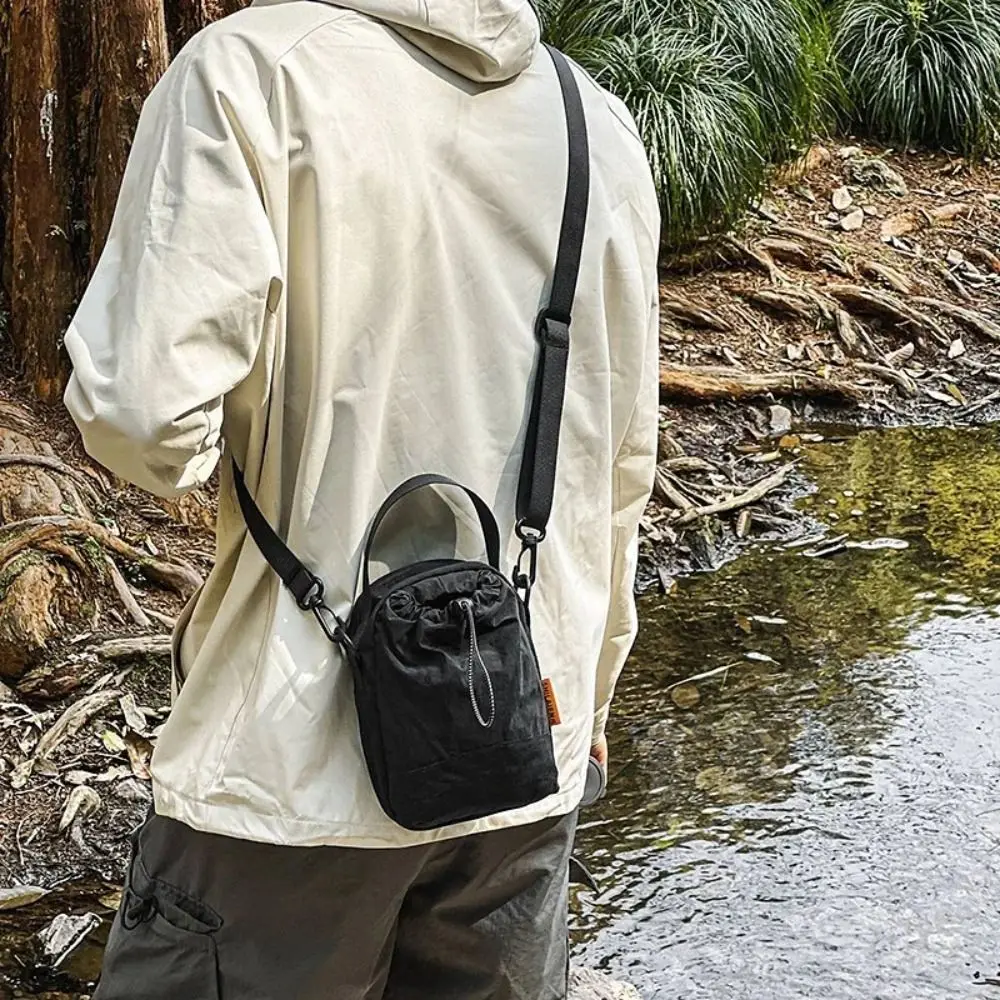 

Sports Nylon Shoulder Bag Coin Pouch Casual Drawstring Crossbody Bag Korean Style Solid Color Mobile Phone Pack Unisex