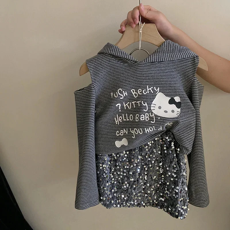 

Sanrio Hello Kitty Printed Long Sleeved T Shirt Women Autumn Striped Off Shoulder Patchwork Hooded Top Set Sequined Short Skirt