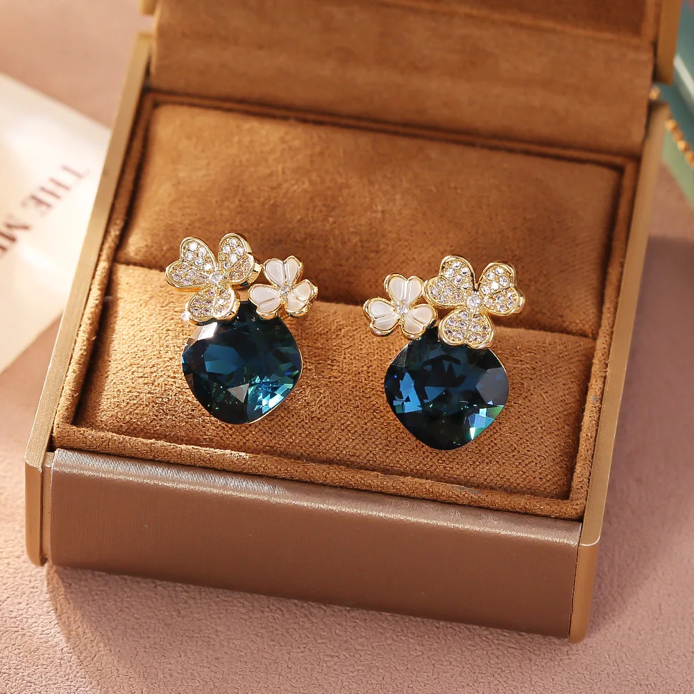 

High-end blue crystal earrings niche light luxury temperament super fairy flower earrings exquisite fashionable elegant earrings