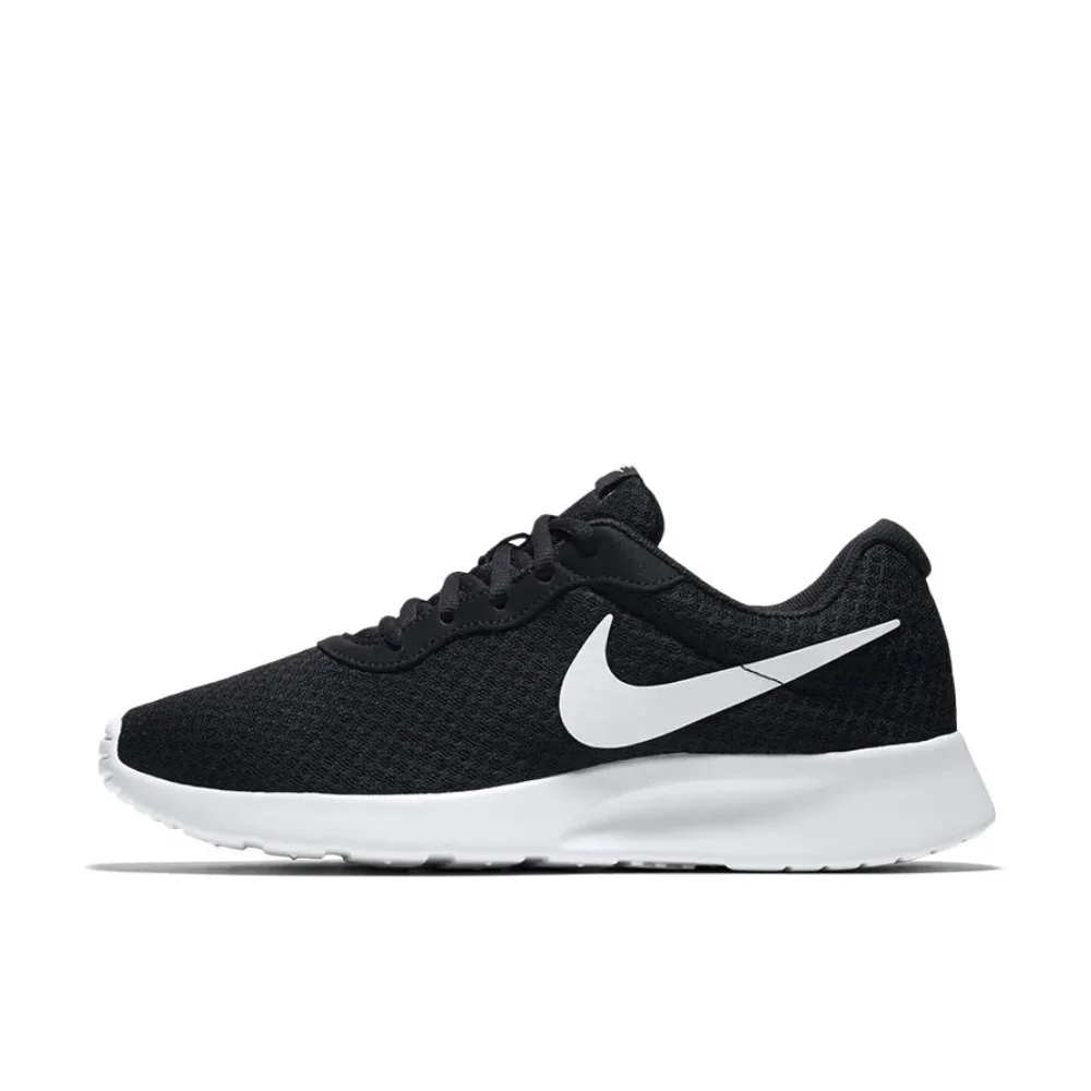 Nike Tanjun Comfortable and lightweight low top casual running shoes for men and women Black and white color scheme