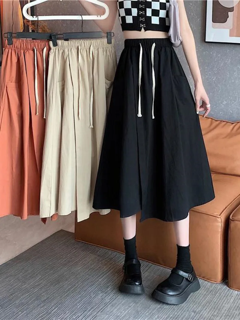 

Irregular half length skirt for women in spring and summer medium length work dress elastic waist loose hem skirt A-line D7SU