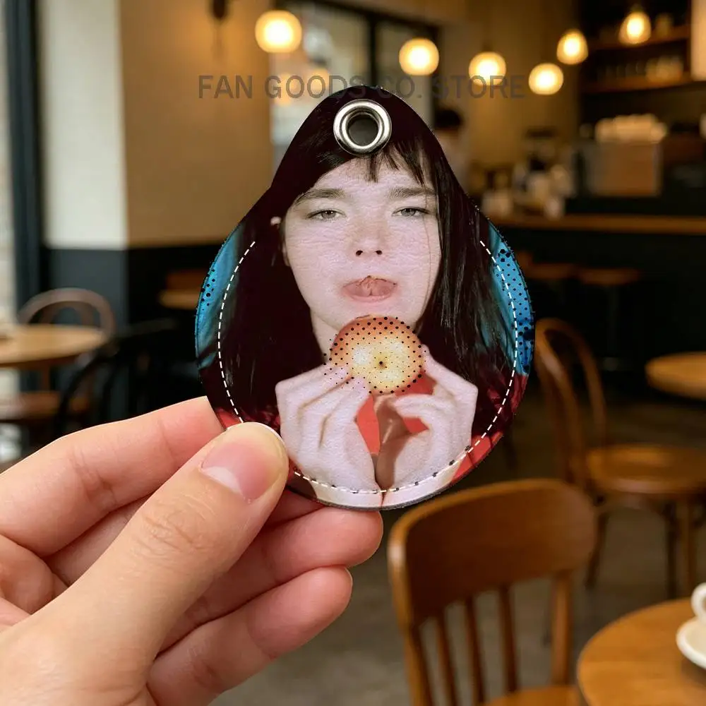 

Bjork in 1993 with her apple PU Leather Card Holder Keychain Key Ring Door Lock Access Tag ID Access Card Air Tag Case Keychain
