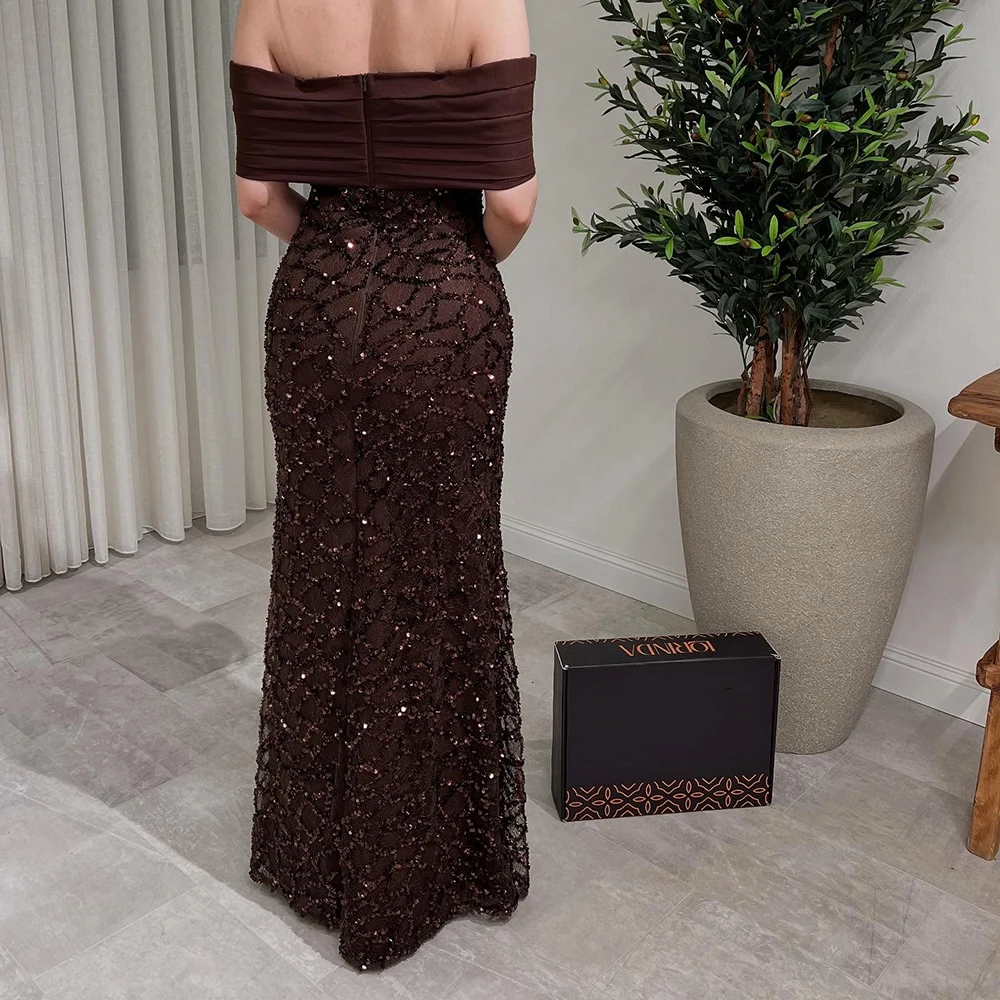 ชุดราตรีทรงเอไลน์แบบสั่งตัด ยาวกรอมพื้น แบบเปิดไหล่ ไม่มีแขน ชุดออกงานพรอม แฟชั่นประดับเลื่อม จับจีบด้านหลัง เปิดหลัง ชุดงานเลี้ยง