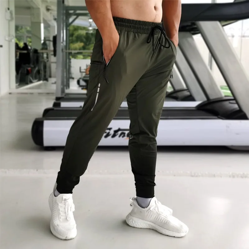 

Summer Thin Men Sports Running Pants Zipper Pocket Athletic Football Soccer Gym Training Sport Pants Legging Jogging Trousers