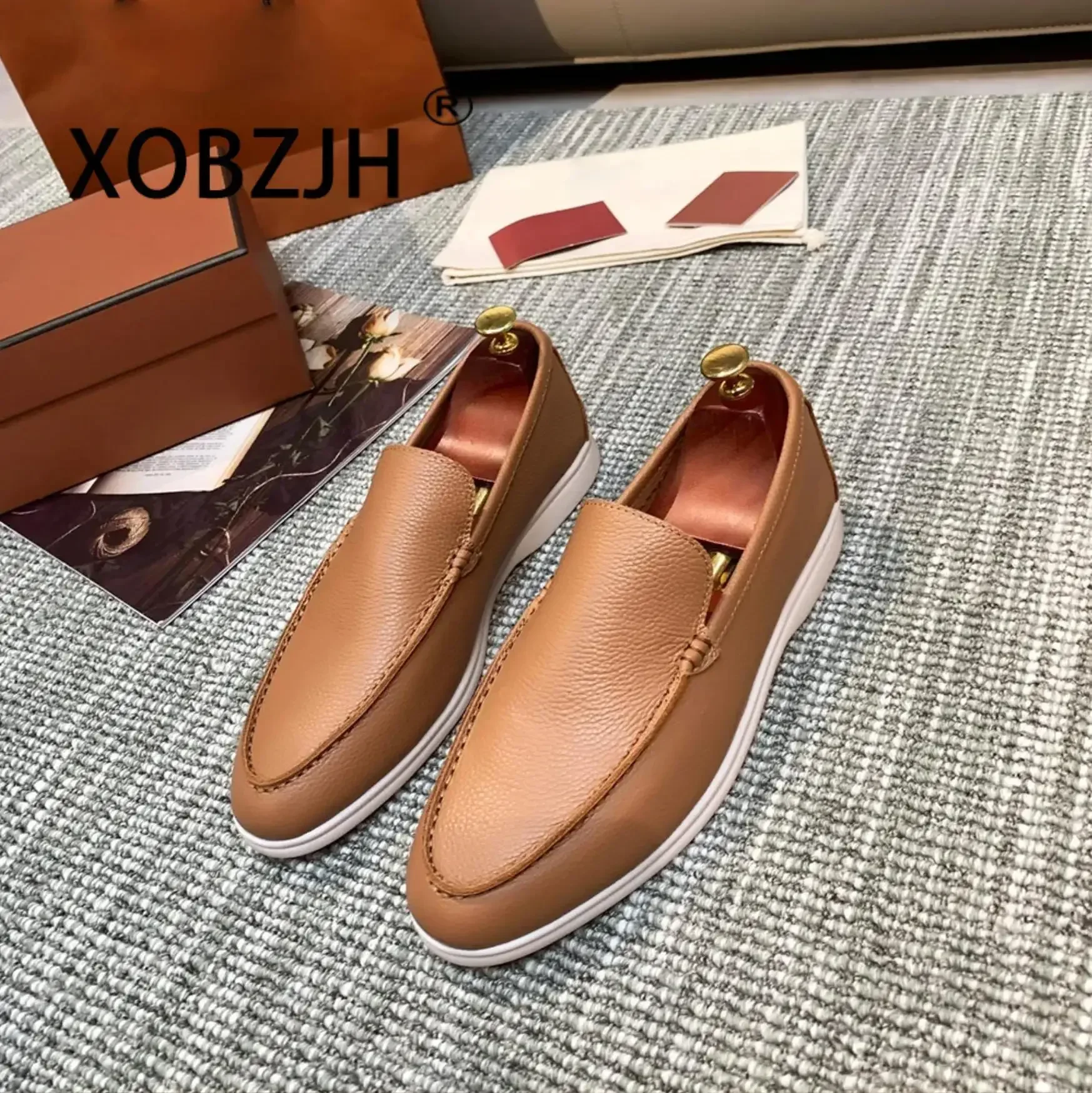 Zapatos planos de cuero de vaca negro para conductor, mocasines a la moda, zapatos para hombres y mujeres, zapatillas sin cordones de alta calidad 2024