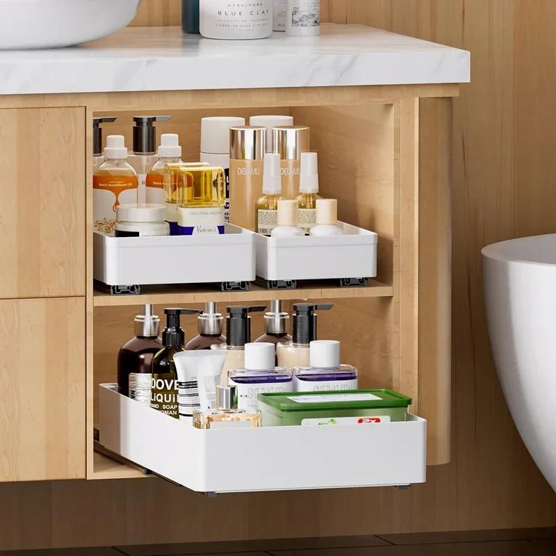 A white pull-out storage tray - a plastic condiment organizer for kitchen cabinets - an under-cabinet storage organizer
