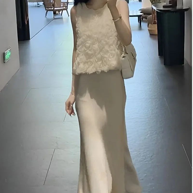 

Skirt suit women's 2024 summer new three-dimensional flower temperament satin top advanced sense bag hip fishtail skirt