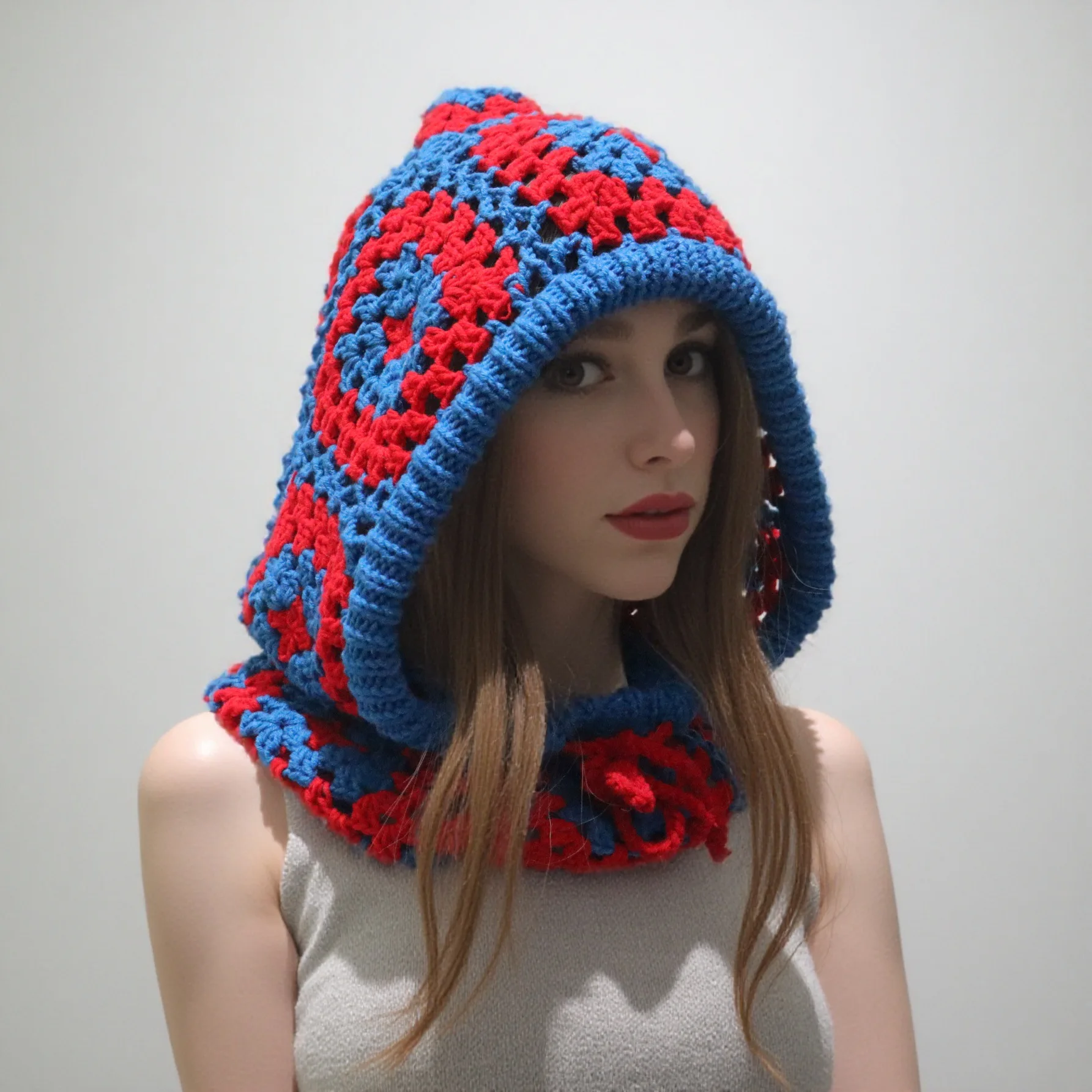 Crochet vintage granny square hooded hat—a cute, pointed pixie-style hat with an integrated neck warmer and ties.