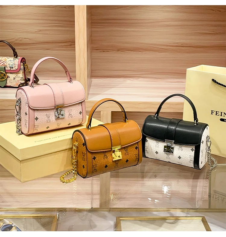 Luxury Brand High-end Texture Hand-held Chain Small Square Bag Fashionable Women's Versatile Cartoon Printed Diagonal Cross Bag