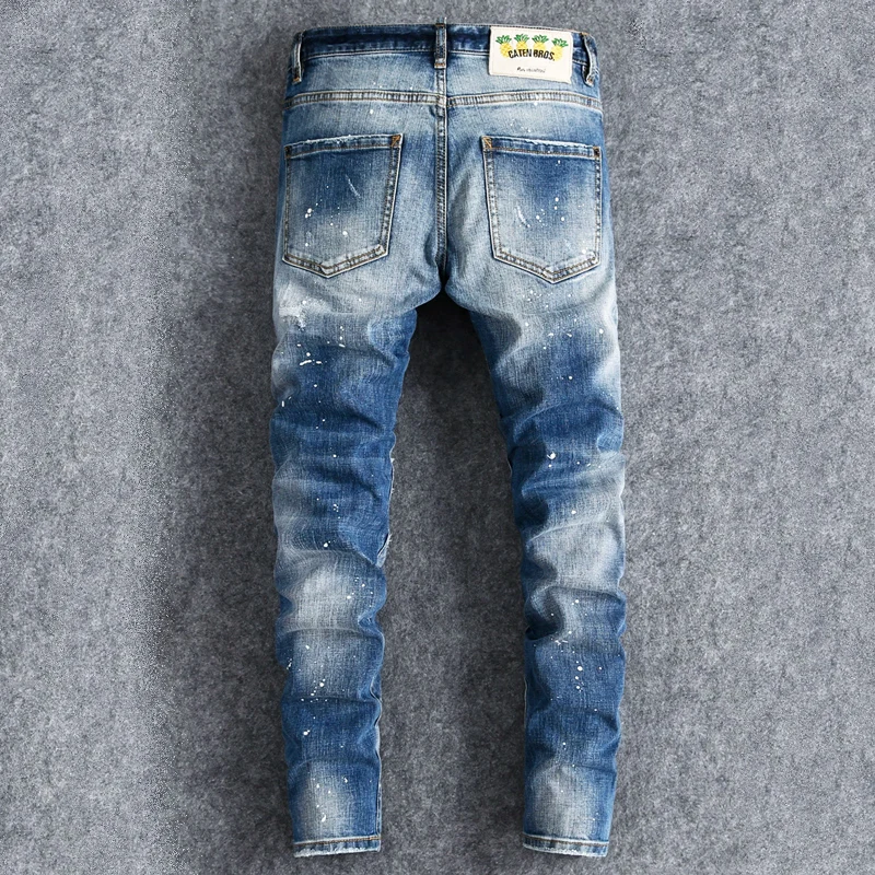 y2k fashion new jeans with painted pleats, slim fit, elastic wash, nostalgic perforated patch, light blue jeans, high stree