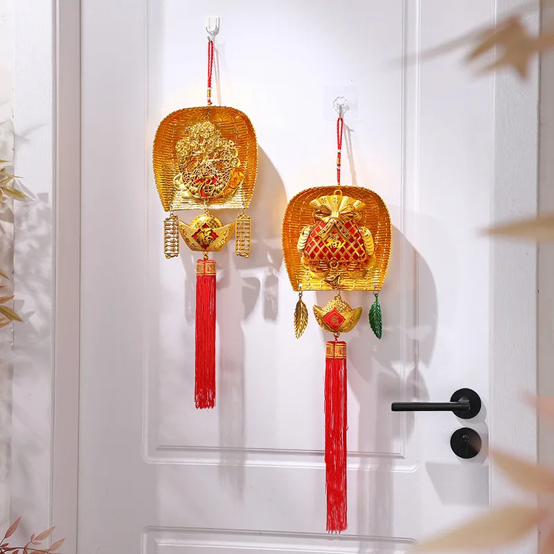 

warming decorations, new house pendants, new house ceremony, dustpans and bucket pendants are arranged on the door of the home