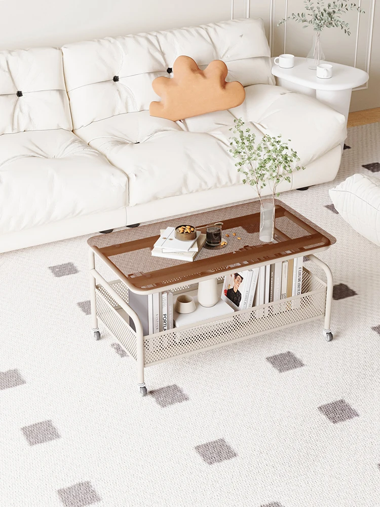

Cream style living room coffee table, household movable tea table, minimalist designer, modern glass small table, tea table edge