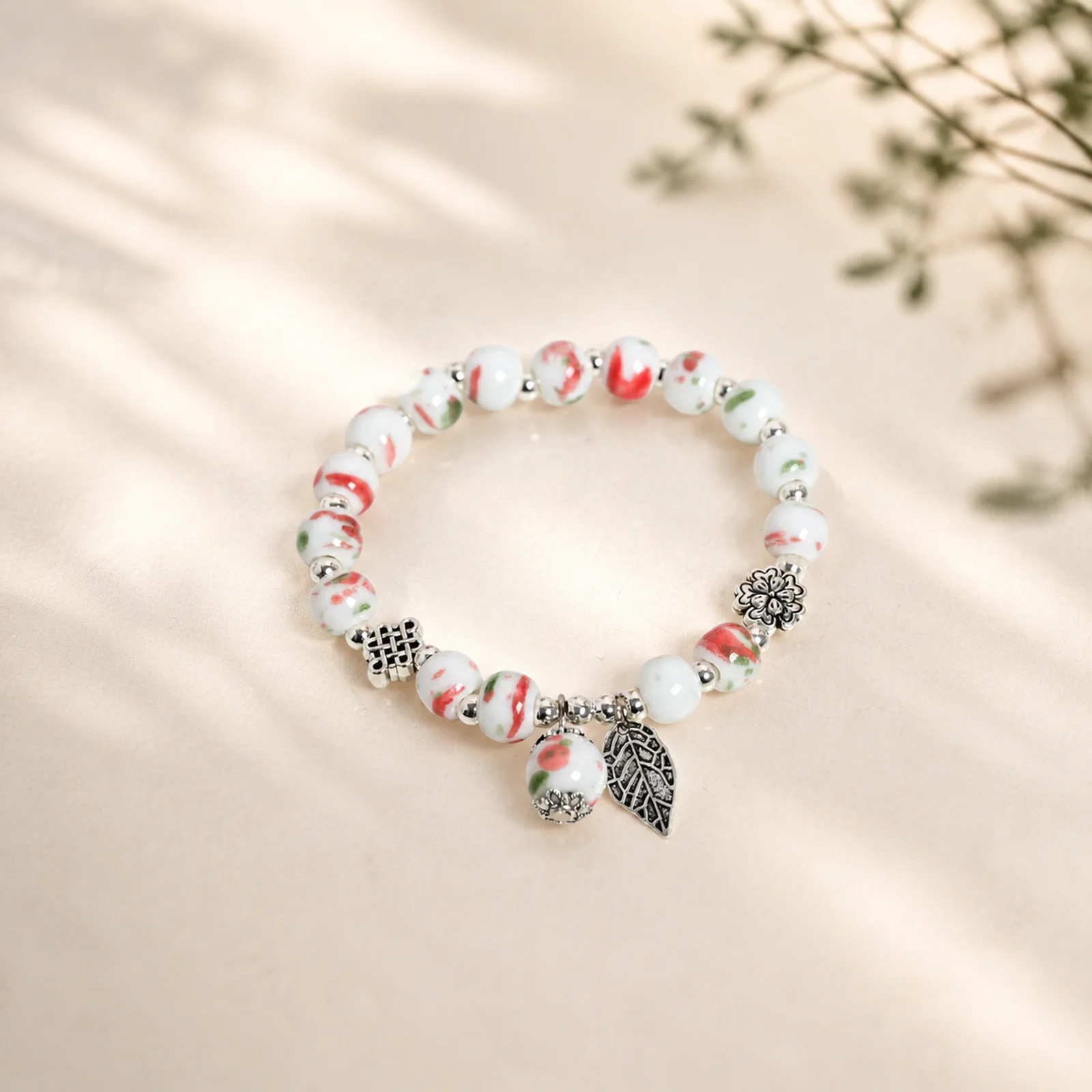 Multicolor Leaf Motif Handmade Ceramic Bead Bracelet Elastic Cord Handwoven Metal Accent Artisan Jewelry 608P7-05