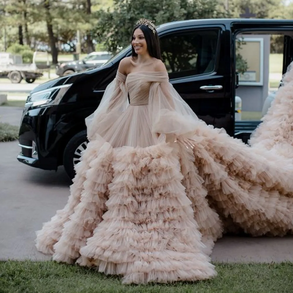 

Amazing Champagne Fluffy Tiered Tulle Bridal Dresses With Long Train See Thru Puff Sleeves Tutu Tulle Wedding Gowns