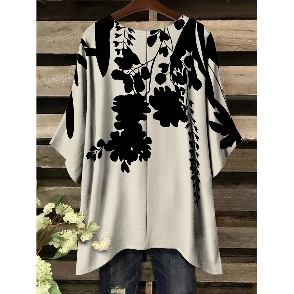 เสื้อทูนิคโบฮีเมียนสำหรับผู้หญิง |   ดีไซน์ลายดอกไม้สีดำและสีขาวหรูหรา รอบคอ ชายกระโปรงพลิ้วไหว เหมาะสำหรับสไตล์ลำลองหรือวันหยุด