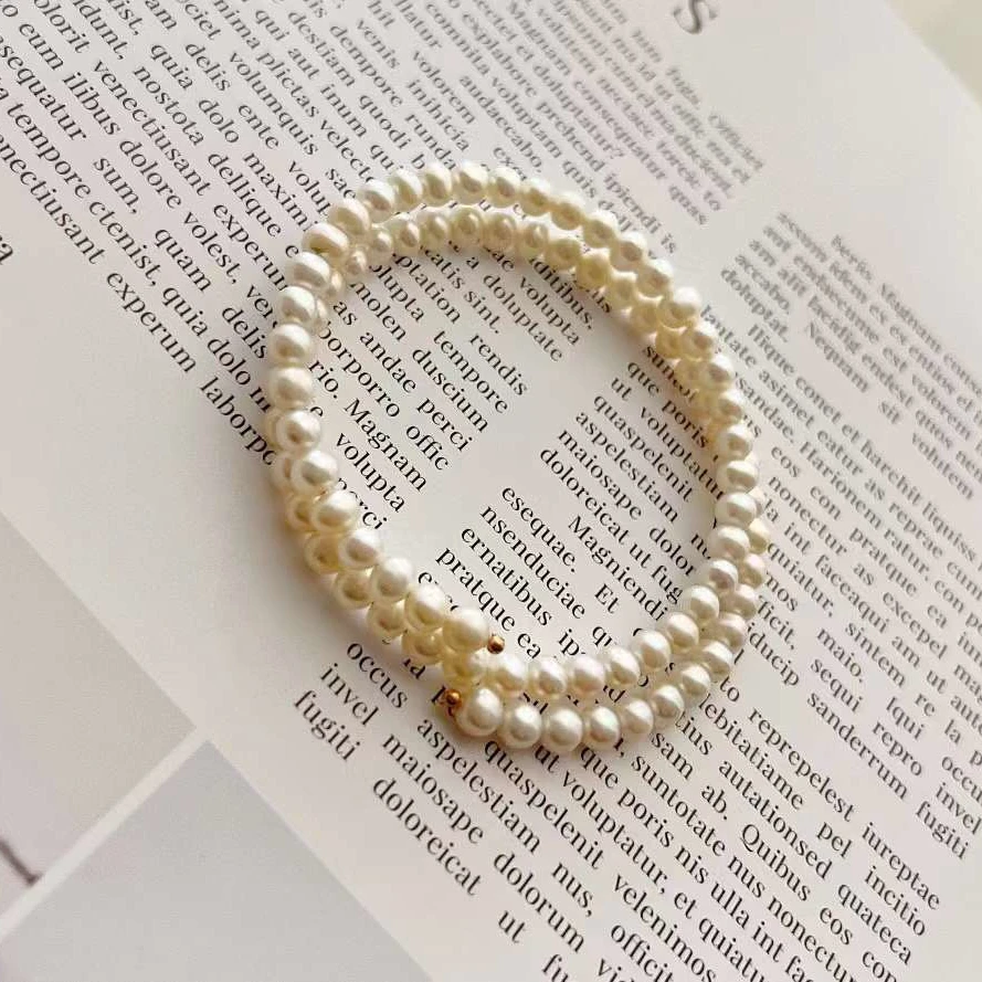 

Manufacturer's special double loop white pearl bracelet 5-6MM round natural high-quality freshwater pearl bracelet for girls