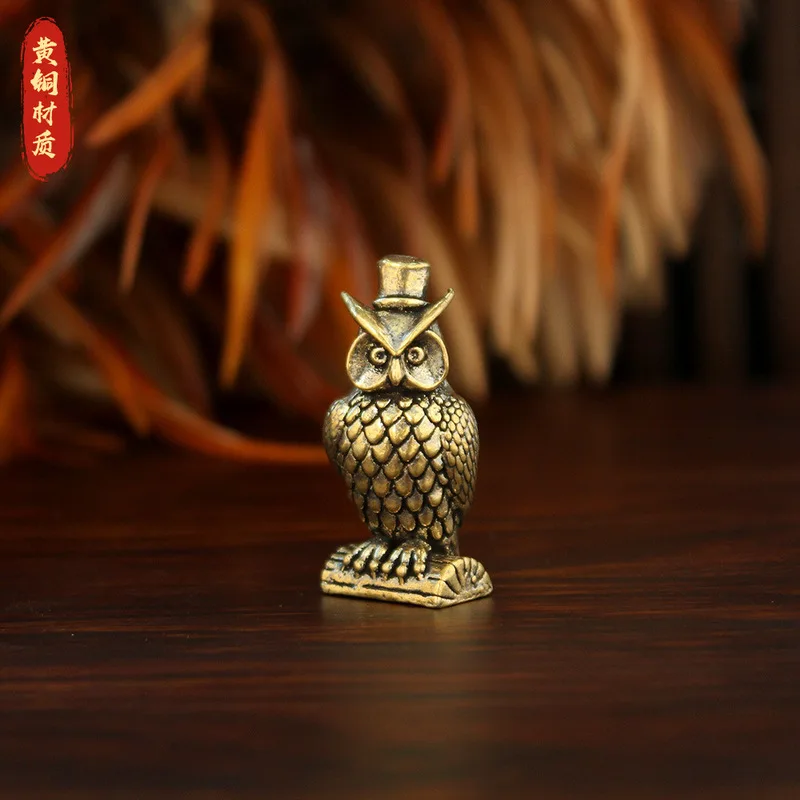 , a collectible item, solid bronze, standing owl, antique-style animal figurine, miniature landscape ornament