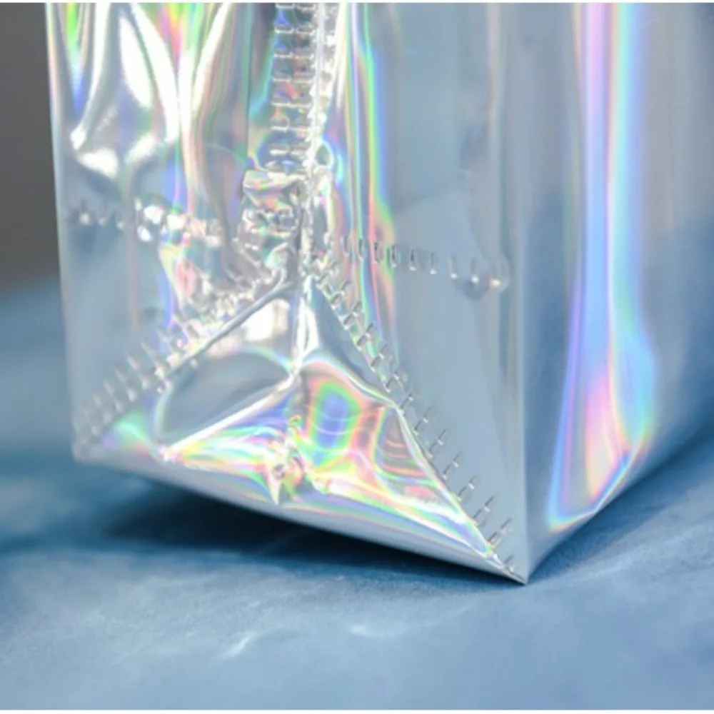 

New Handheld Gift Packaging Bag Thickened Waterproof Tote Large Capacity Laser Shopping Bag Clothing Store