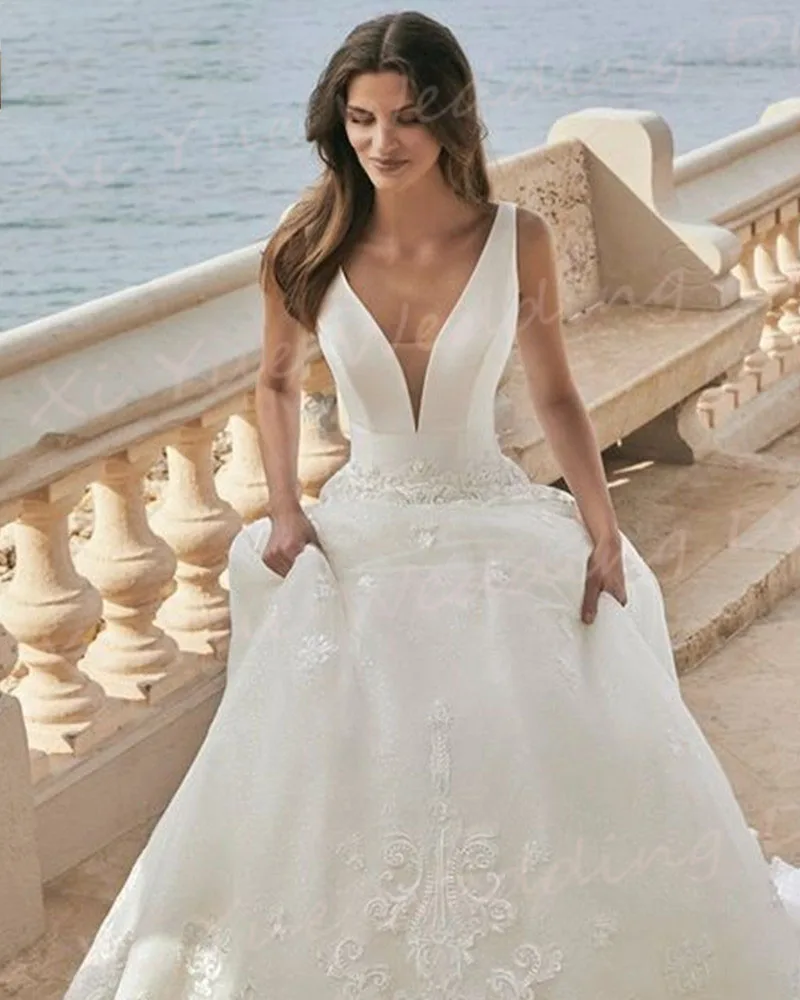 Vestidos De novia elegantes con escote en V profundo, vestidos De novia con apliques De encaje, sin mangas, Espalda descubierta, tul moderno