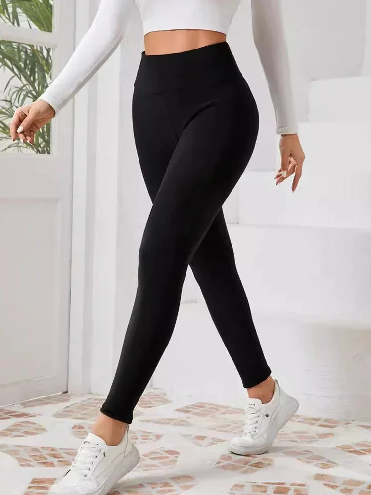 Leggings de cintura alta de Color sólido con forro polar para mujer, pantalones gruesos y cálidos elásticos con bolsillo térmico, pantalones negros para evitar el frío, Invierno