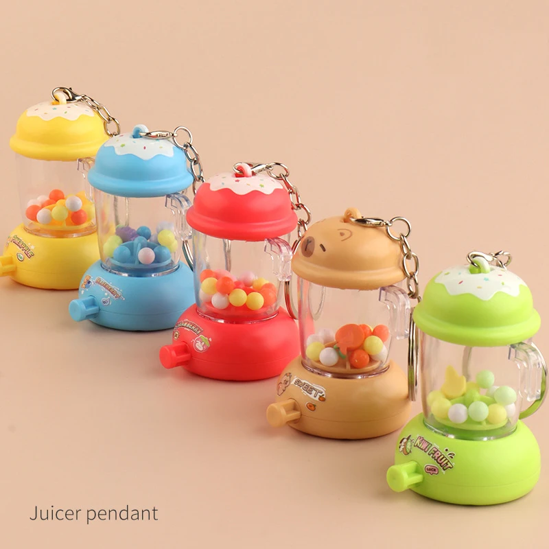 Dessin animé amusant presse-agrumes porte-clés pendentif Mini presse-agrumes breloques enfants jouets créatif sac à dos breloques accessoires presse rotatif presse-agrumes jouet