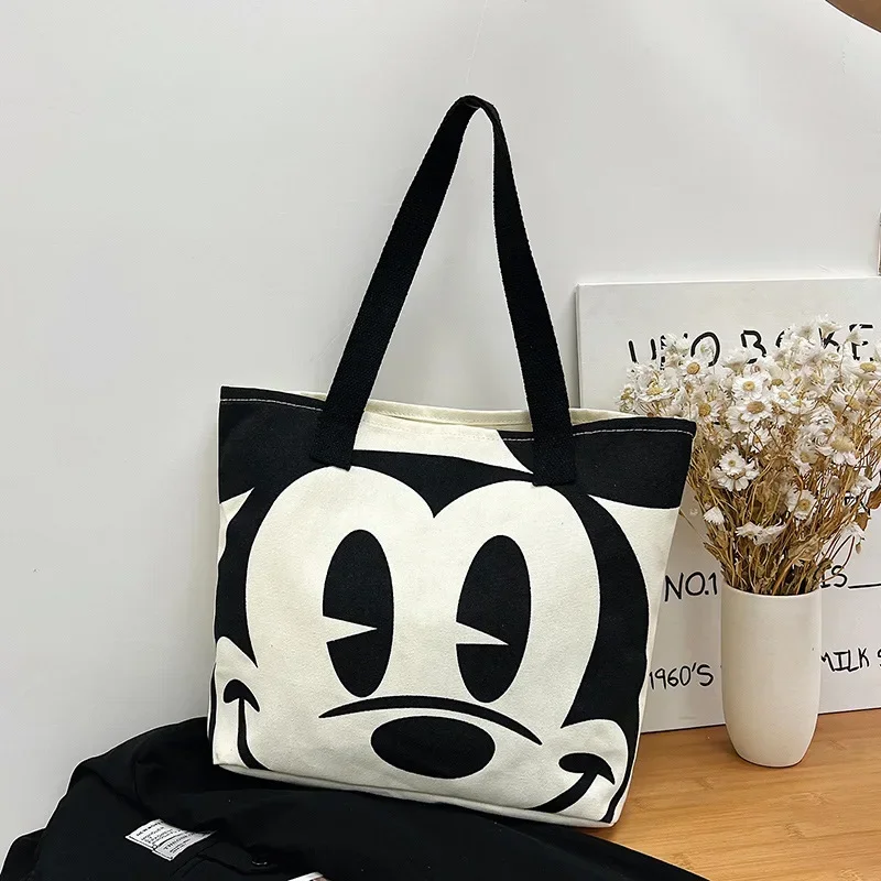 Disney 2025 New Cartoon Mickey Minnie Ladies Handbag Student Fashion Canvas Shoulder Bag Donald Duck Large Capacity Shopping Bag