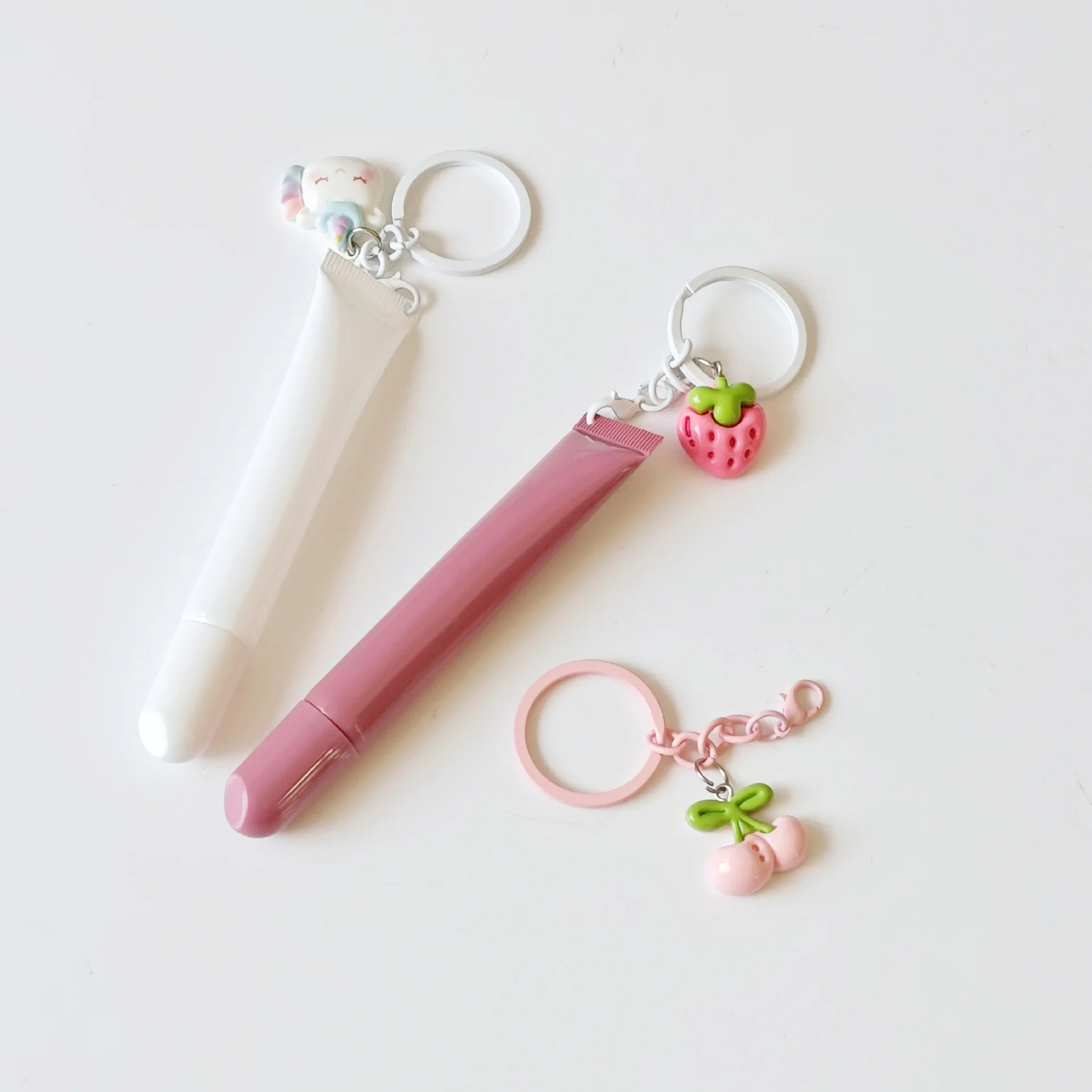 Squeeze Tube Empty Lipgloss Containers Bottle Packaging Screen Printing Custom Logo 10ml Plastic Lip Gloss Tubes With Keychain