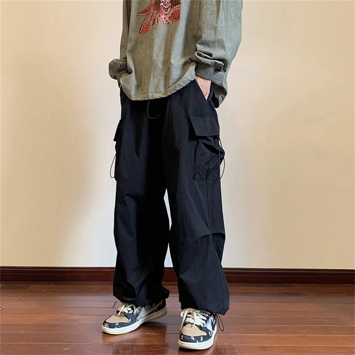 

Streetwear Fashion 2025 Spring Casual Pants Men Elastic Waist Solid Color Cargo Pants Multi Pocket Loose Baggy Pants for Women
