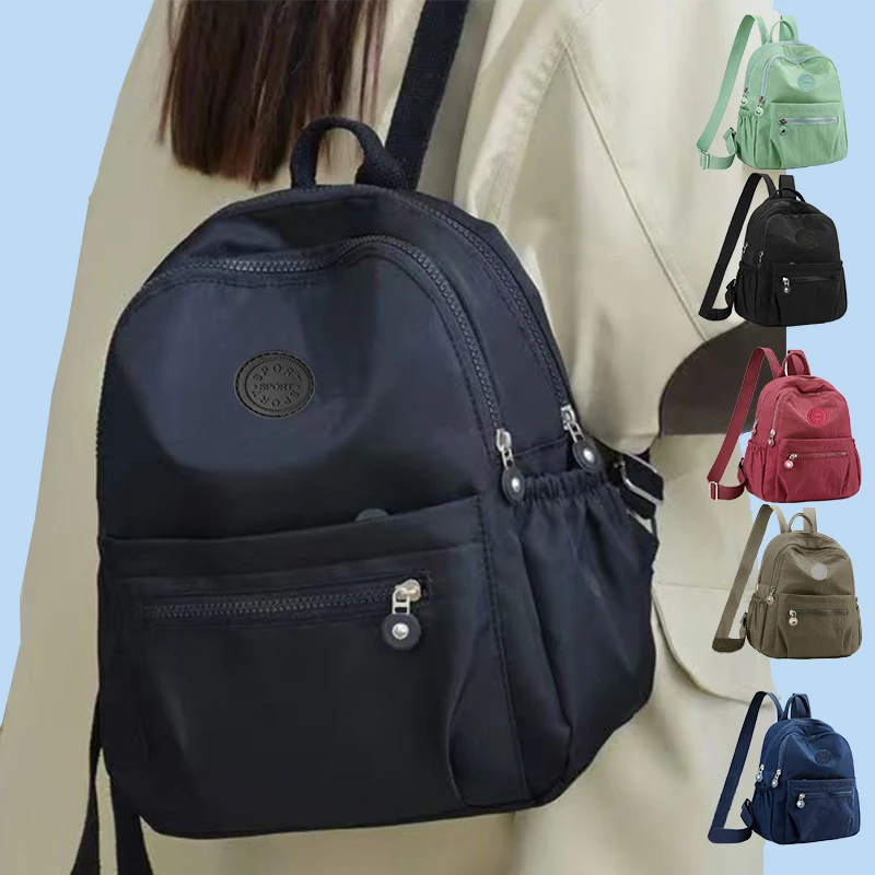 

Женский многоцветный рюкзак с круглым дизайном логотипа. Модная женская сумка через плечо разных цветов.