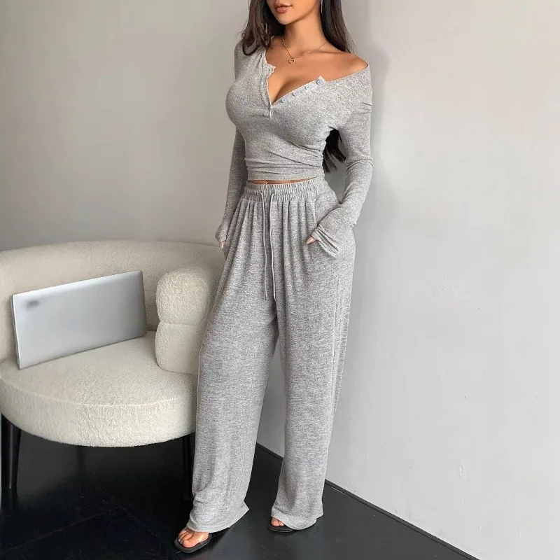 

2025 European and American Cross border New Set Long Sleeve Buckle Solid Color Tight Top and Pants Two Piece Set for Women