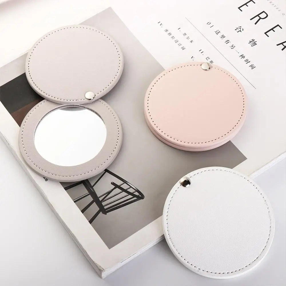 Miroir de maquillage rotatif en cuir PU pour femmes et filles, miroir de poche compact, ultra-fin, accessoires de voyage, cosmétique, cadeau pour elle