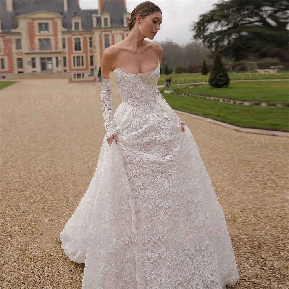 Luxueux une ligne robes De mariée pour femmes dos nu dentelle robes De Novias De Boda robes De mariée personnalisées à manches longues robes