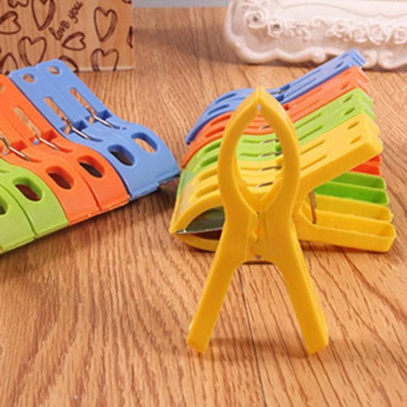 

Random 8Pcs/Set Hanger Clips Large Plastic Windproof Beach Towel Clothes Pins Spring Clamp Clothespin Powerful Hot New Cheap‘