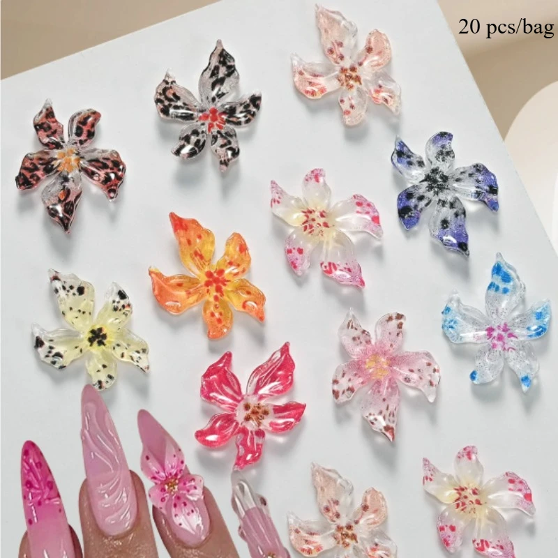 1箱12個入り レジン製リボンネイルアートデコレーション 3D カラフルで可愛いリボン、ハート、星、ラインストーンデコレーション ペンとピンセット付き