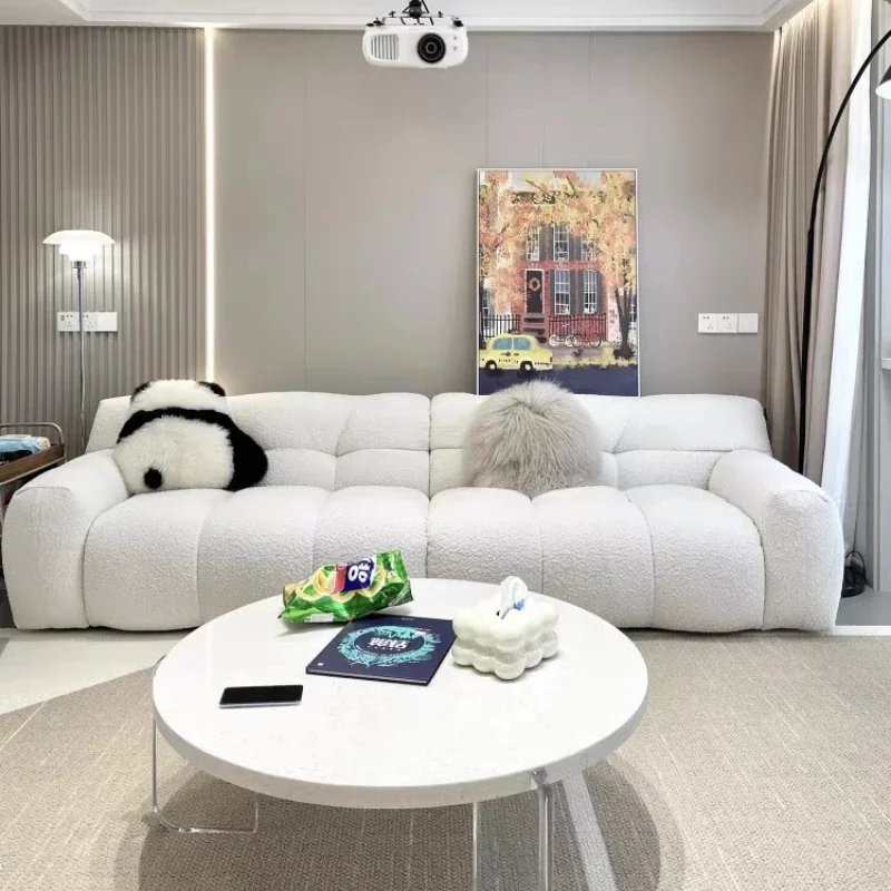 

Designer Modern Living Room Sofa Minimalist Family Comfortable Couch Living Room Sofa Puff Replica Divano Postmodern Furniture