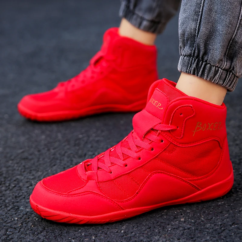 รองเท้ามวยปล้ํามืออาชีพ (ผู้ชายผู้หญิง) รองเท้ากีฬาน้ําหนักเบาหลากสี (สําหรับการชกมวยและการฝึกซ้อมกลางแจ้ง)