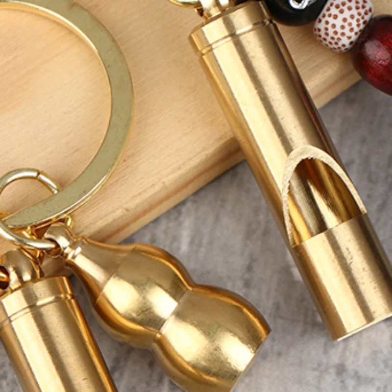 

1 шт. латунный аварийный свисток для выживания, высокий децибел, портативный брелок, уличные инструменты, свисток для тренировок в судей, кемпинга, пешего туризма