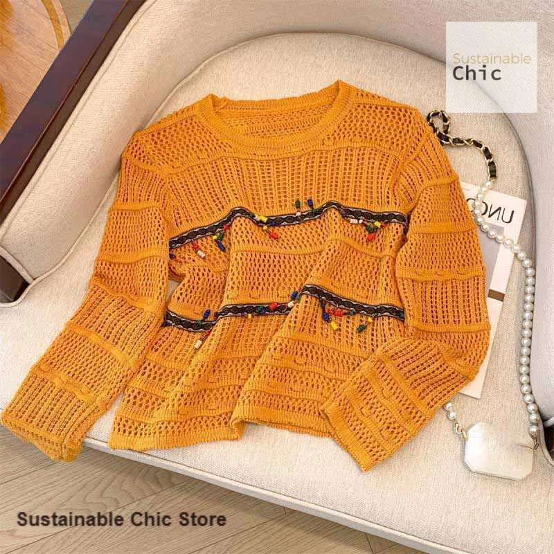 

Korean national style tassel openwork sweater long sleeve outer wear women's spring and summer new blouse design sense top