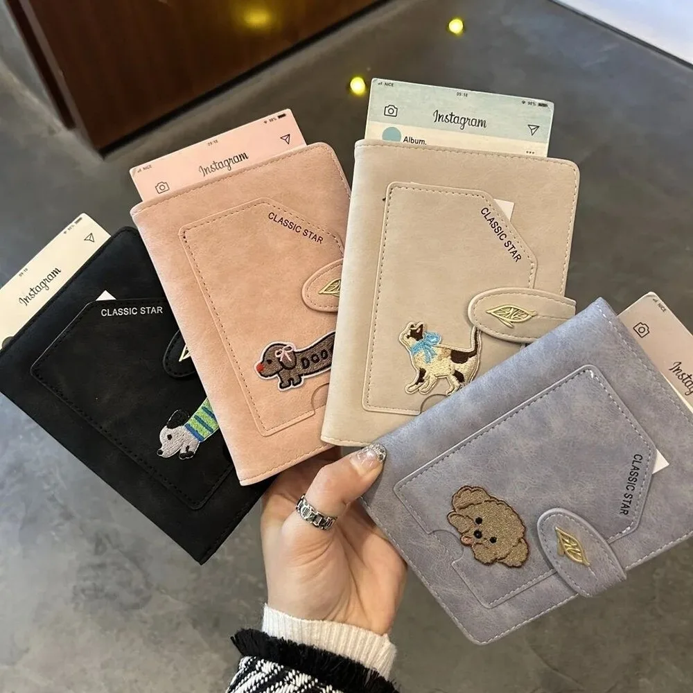 ปกหนังสือเดินทางลายการ์ตูนสัตว์ ดีไซน์ RFID วัสดุกันน้ำ พร้อมที่หนีบตั๋ว หนัง PU ปักลายสุนัข