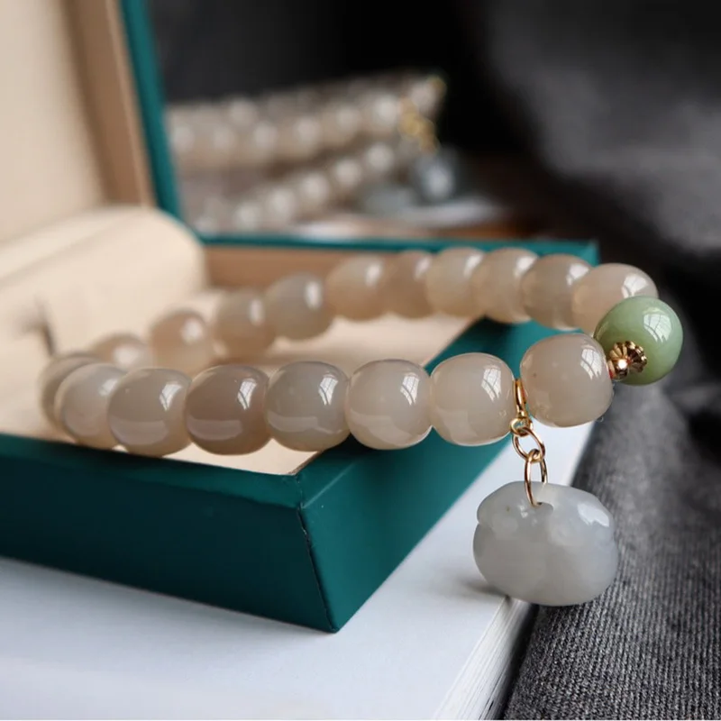 Natural Hotan Jade Root Pink Old-Style Bead Bracelet With Smoky Purple Ruyi Lock Pendant