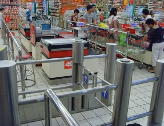 Sistema di controllo accessi pedonale automatico Cancello girevole con barriera a ribalta in acciaio inossidabile 304